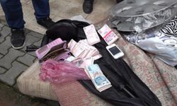 Toroslar'da çöp evden 8 ton atık ve ruhsatsız tüfek çıktı