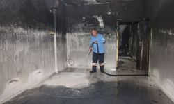 Akdeniz'de yangında kullanılamaz hale gelen evde izler siliniyor