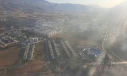 Mersin'de yerleşim yeri yakınında çıkan yangın, büyümeden kontrol alltına alındı