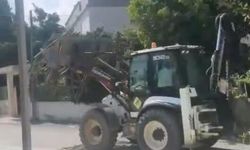 Trafikte yük taşıyan kepçenin operatörüne para cezası